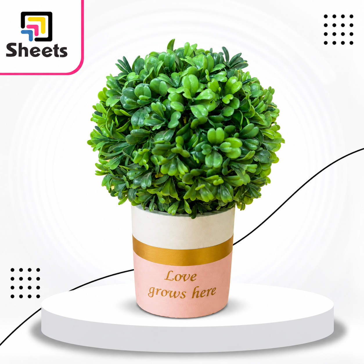 3854 - ( كود P10933 ) - ( القسم Gift Shop ) - ( الصنف Planting-Love Grows-Pink ) سعر البيع 260 Artificial Green Plant in Decorative Pot – Love Grows Here (Pink) - Image 1